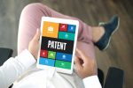 Firdapse | Lambert-Eaton News | Patents | Person holds a computer tablet displaying the word 'patent'